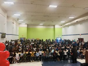 Bradford Academy elementary schoolers gather in the gym for the Scholar Achievement Awards Ceremony